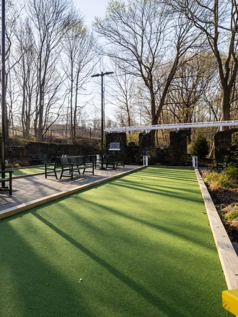 Price Landscape and Construction finished job site of an outdoor bocce ball court