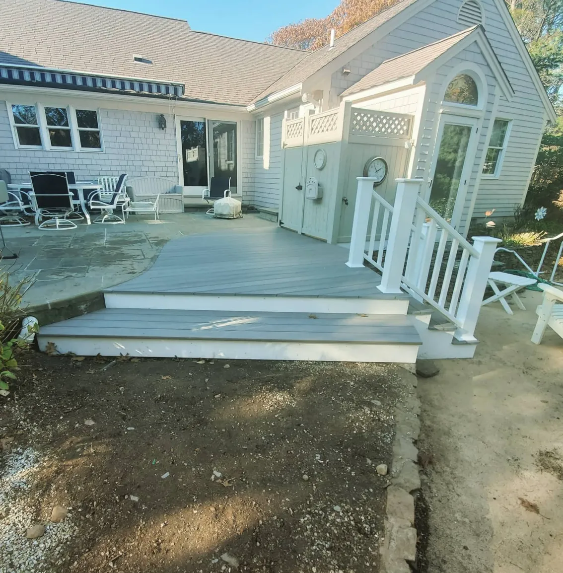 a house with a deck and patio