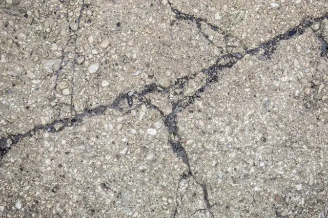 Pavement crack repair on a driveway in Massachusetts