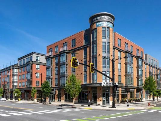 Commercial services page link, apartment building exterior