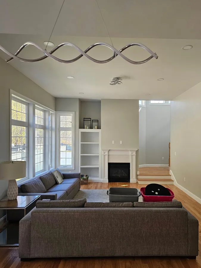 Open living room with fireplace and built-ins