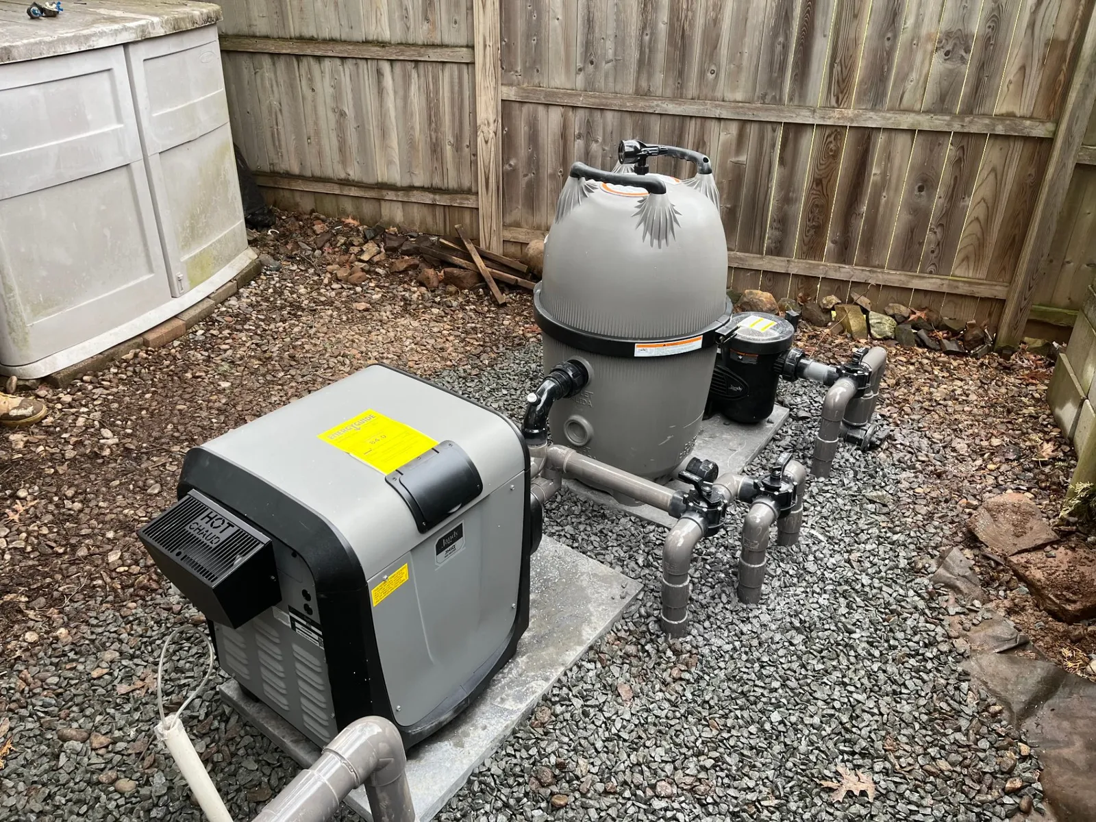 Brand new DE filter installed on concrete pad — equipment upgrade complete