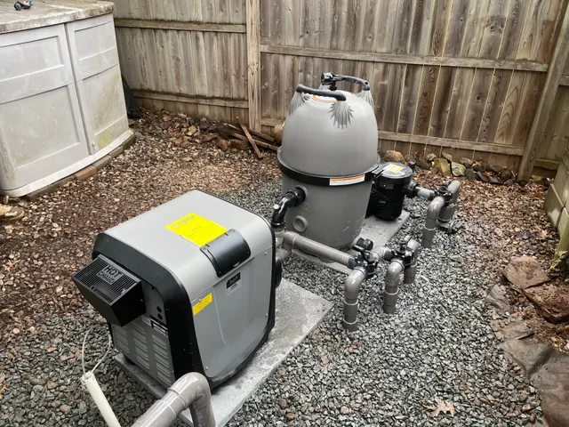 Brand new DE filter installed on concrete pad — equipment upgrade complete