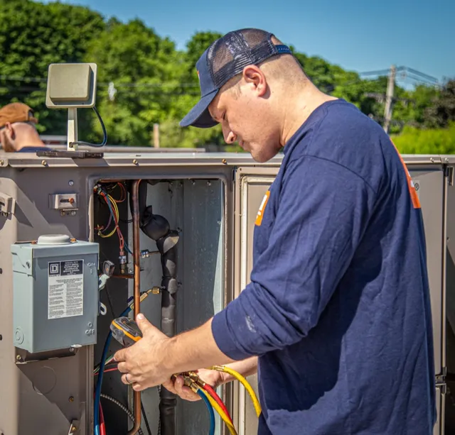 Technician with gauges