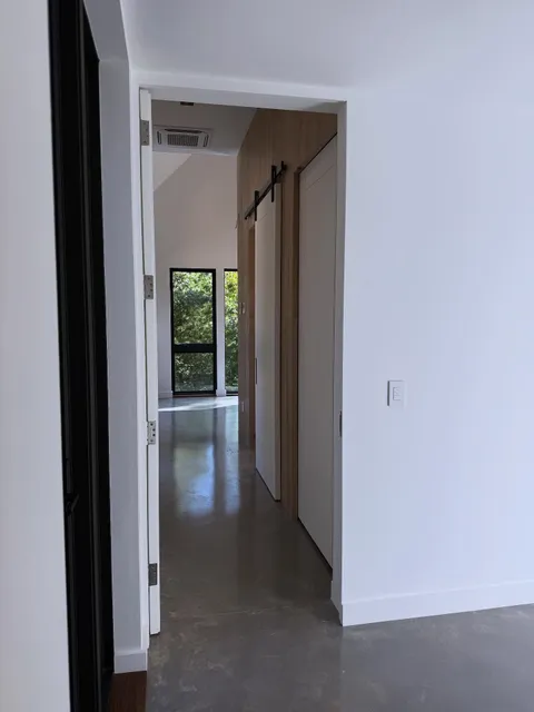 A view into the master suite that instantly pulls you in….more to come of the amazing Turtle Pointe Haus we are handing off this week! Stay tuned and let us know what you want to see more of! #smithfieldbuild #echelonbuilders #interiorfinish #luxuryhomes #custombuild #millwork #architecture #interiordetails

#handmade #architecturalmillwork #custominteriors #finecraftsmanship #LuxuryHomes #oakceiling #finewoodworking #handmade #gobuild #woodceiling #finewoodworking #finehomebuilding  #customkitchen #CustomCabinets