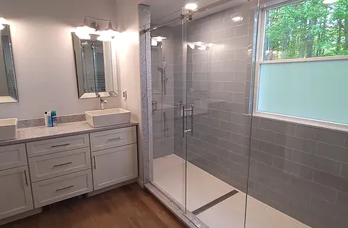 Custom master bathroom, tile shower, black shower fixtures, shower glass door, custom vanity, cookhouse cabinetry and bath