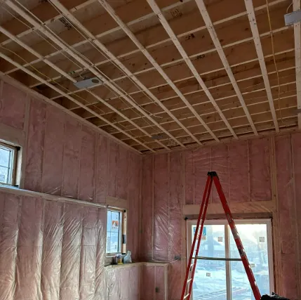 Insulated basement walls designed to maintain consistent indoor temperatures and reduce heat loss in Franklin, Massachusetts