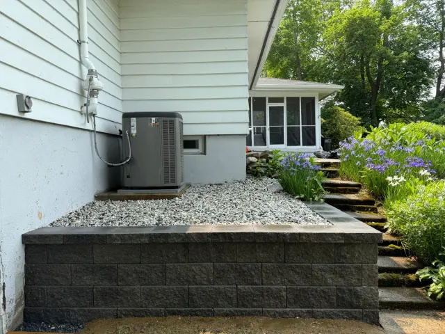 Retaining wall installation by Goodwood General Construction in the Greater Boston area.