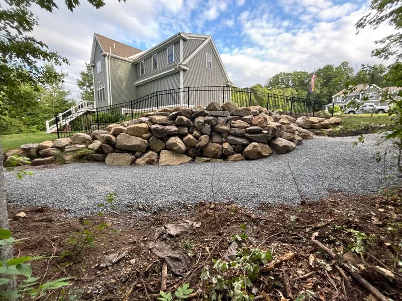 Backyard Transformation Mastery: Stunning Retaining Wall and Fence Creation by Martin's Landscaping & Construction
