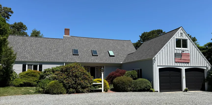 Complete asphalt shingle roof replacement with skylights — Osterville, MA