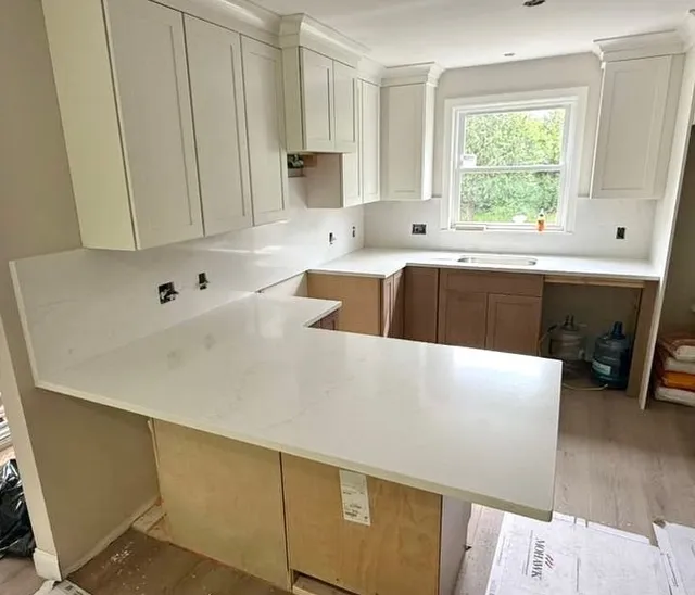 ✨ A radiant Menton Quartz installed in Westport, MA
Featuring a full matching backsplash