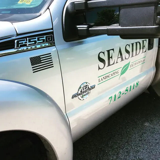 seaside landscaping truck proving site excavation, landscaping, and hard scaping