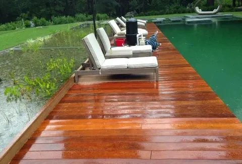 pool decking with lounge chairs and modern outdoor area using Bionova decking in Newtown CT