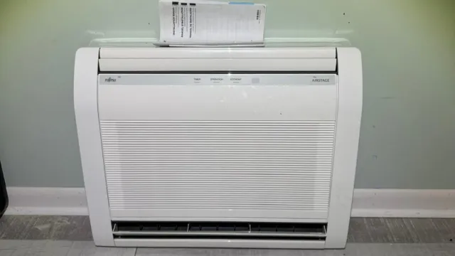 Newly installed Fujitsu Airstage floor-mounted ductless heat pump unit