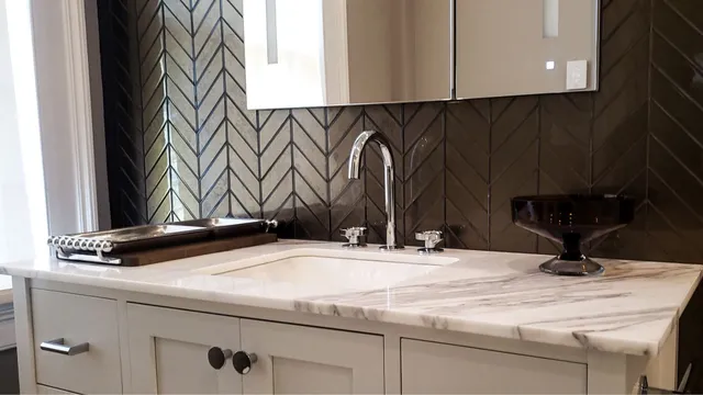 Bathroom remodel with custom vanity and high-end fixtures in Portsmouth, NH