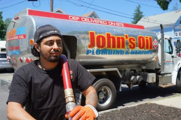 John's Oil & Propane heating oil delivery truck and driver
