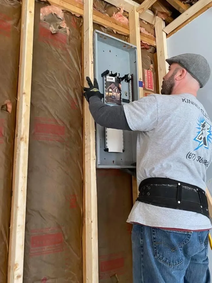 New load-center panel set into an open stud bay