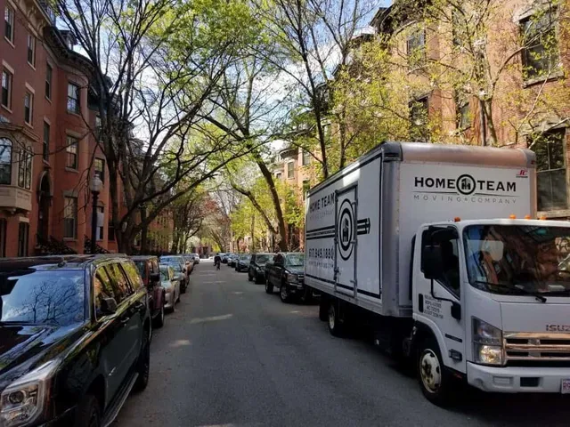 Small truck working a Boston South End brownstone block