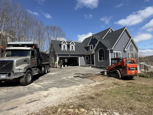 Saccuzzo Asphalt crew prepping a driveway with heavy equipment