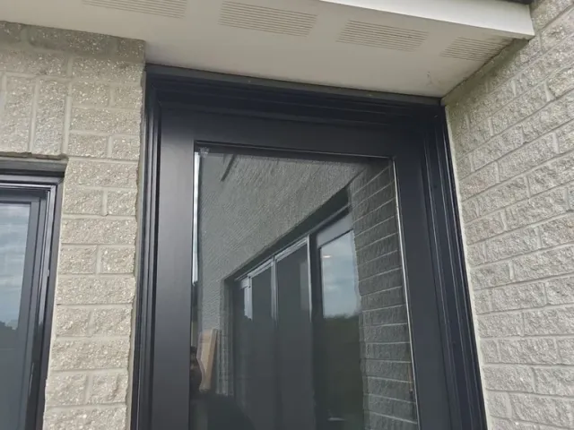 Residential doorway sealed against drafts and moisture