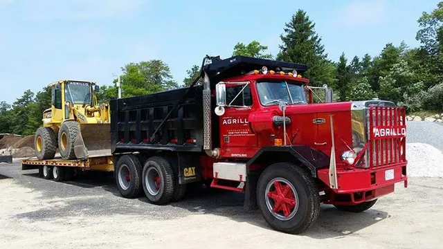 Agrillo landscaping services - showing the heavy equipment being 
prepared for the next landscape project.