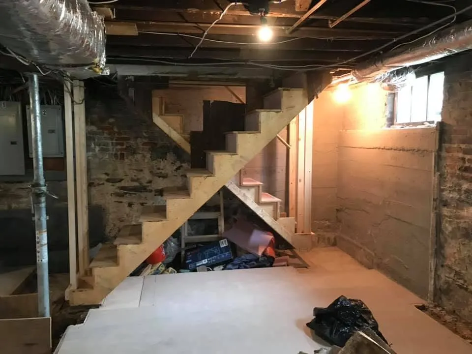 Job-site cut station in basement remodel