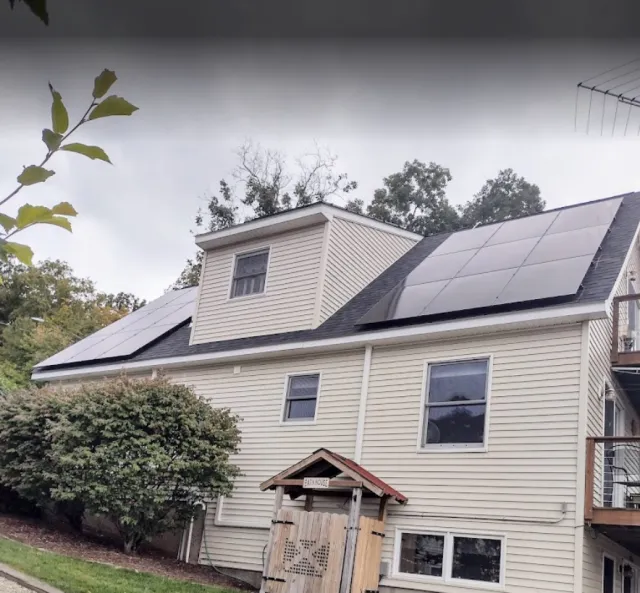 House with solar panels and siding