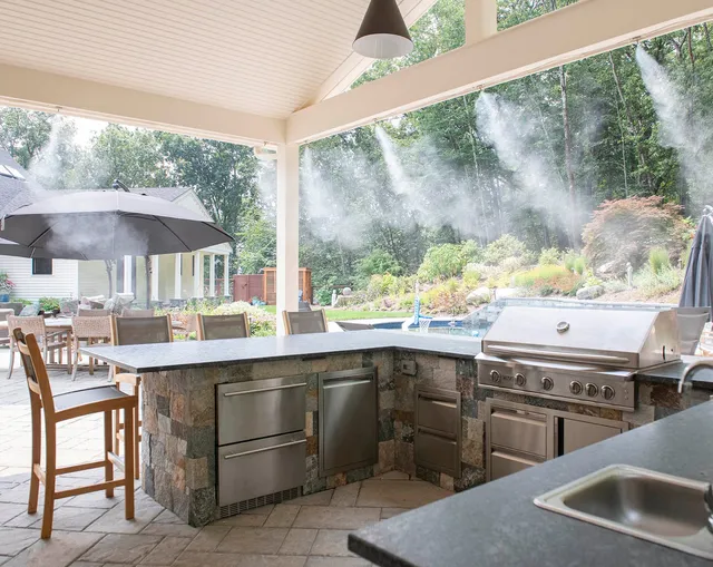 Nothing says July 4th weekend like firing up the grill and spending the day outside!

This custom outdoor kitchen is ready for burgers, BBQ, cold drinks, and a whole lot of time with family and friends. Integrated misters keep things cool and comfortable even on the hottest of afternoons, so you can actually enjoy being outside all day.  It's one of those spaces that makes you want to stay and relax long after dinner is over.

Here's to great food, great company, and making the most of summer. Happy Fourth of July weekend! 🎆

@jhs_landscape_const 

#OutdoorKitchen #BackyardLiving #OutdoorEntertaining  #LandscapeArchitect #AngieVergeLandscapeDesign