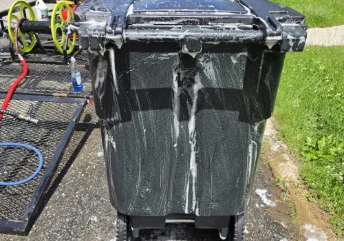 garbage and recycling bins scrubbed and washed