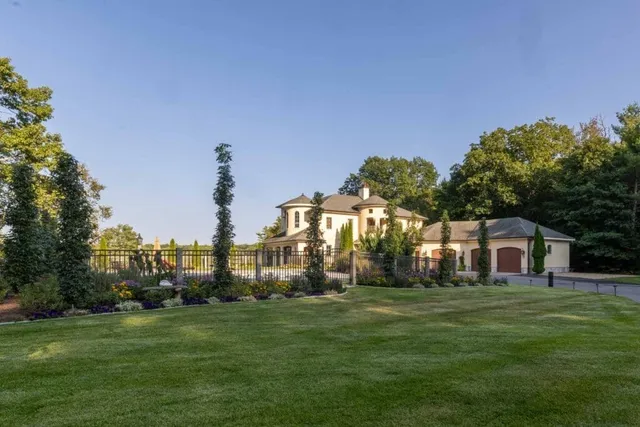 Boxford, MA landscape maintenance: maintained lawn and beds