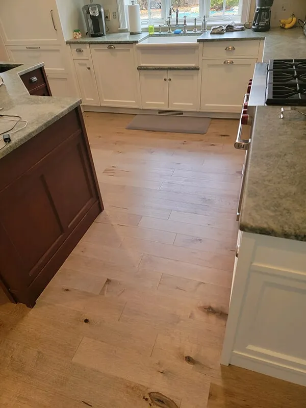 Hardwood plank floors in kitchen in Ashland, MA