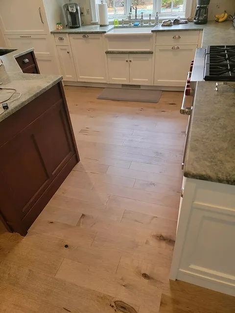 Hardwood plank floors in kitchen in Ashland, MA