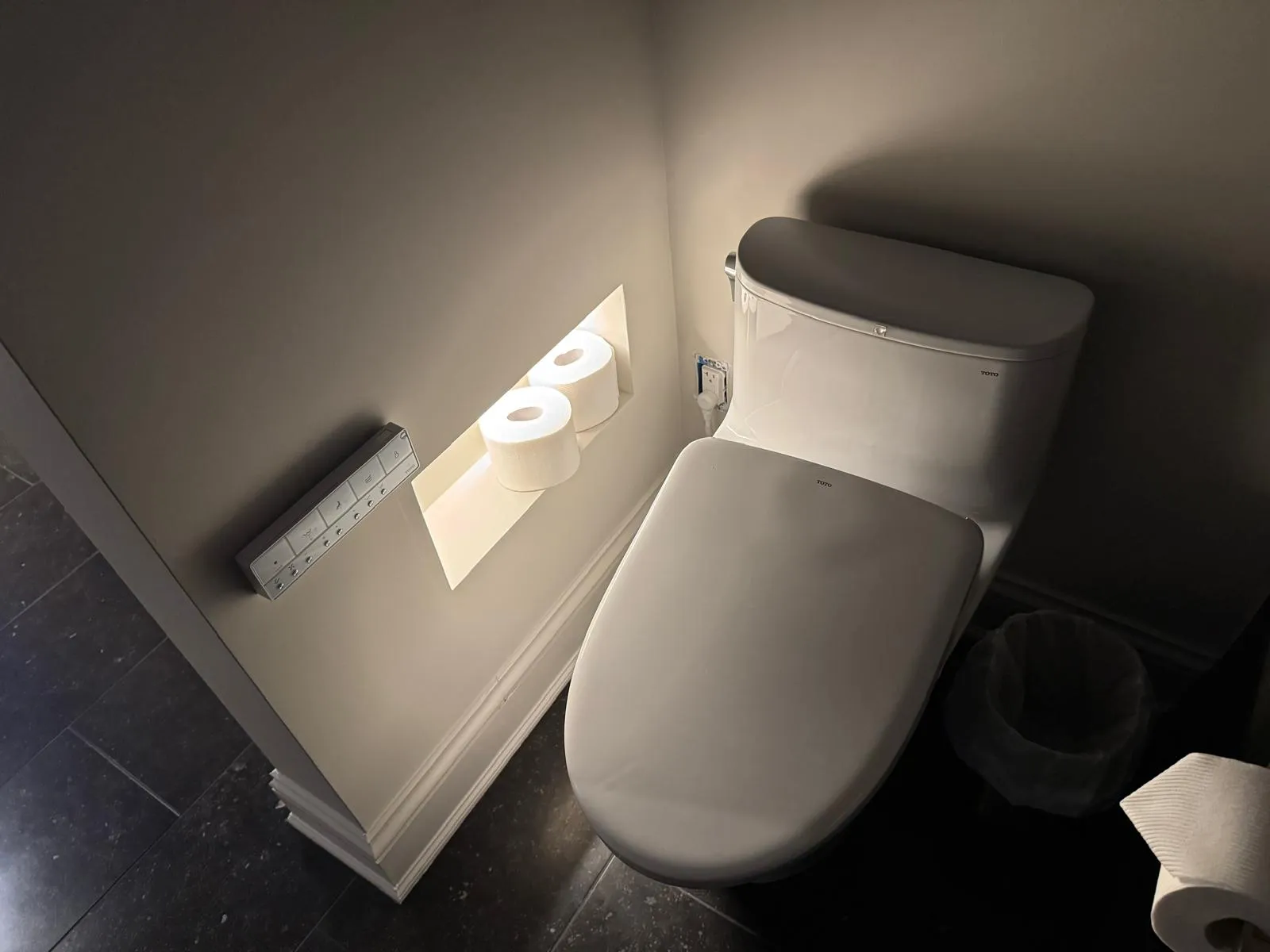 LED-lit recessed toilet paper niche