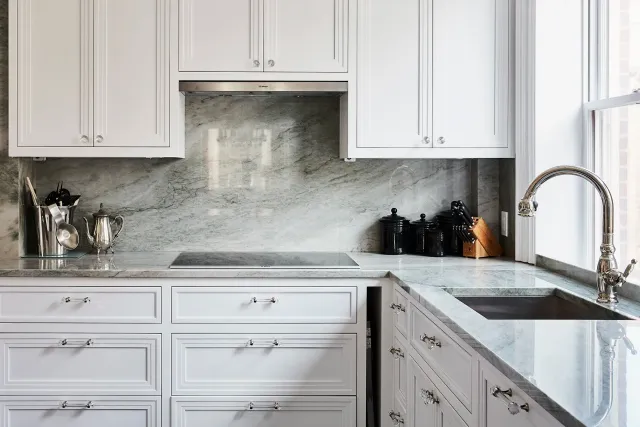 Marble kitchen counters and custom cabinetry