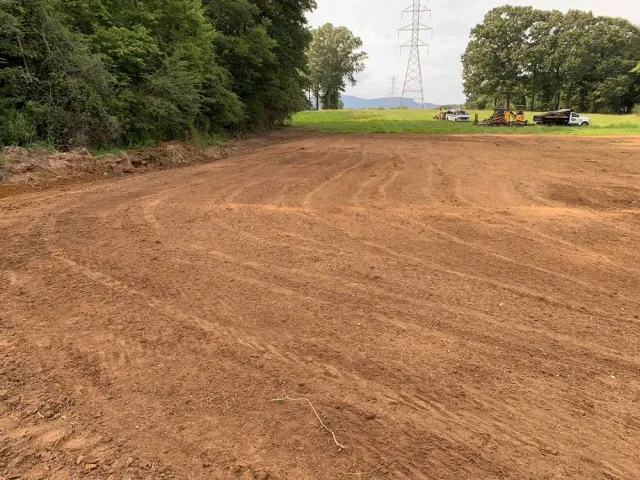 Our Site Grading service ensures your land is expertly leveled and prepared, providing strong foundations for construction or landscaping projects while preventing drainage issues and enhancing property stability. for Witt Excavating in Hudson, NH