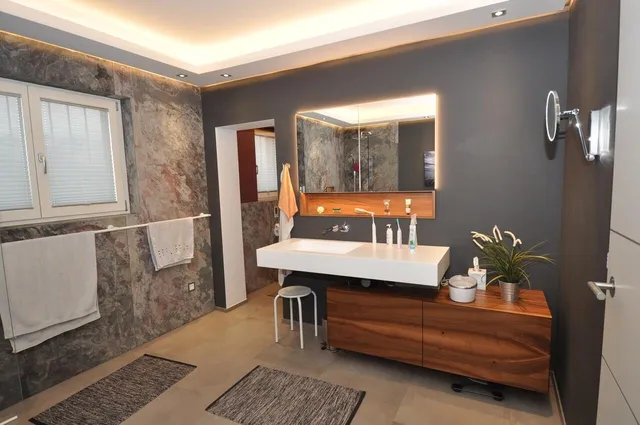 Grey bathroom vanity with quartz countertop in Bow, NH remodel