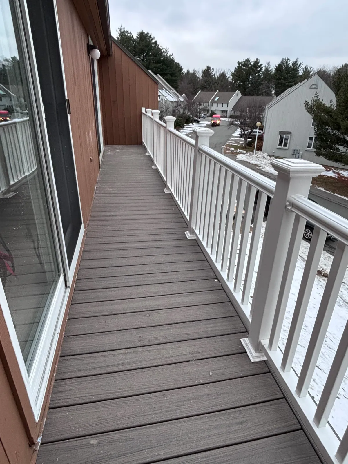 View of new Trex Enhance decking and white vinyl railings