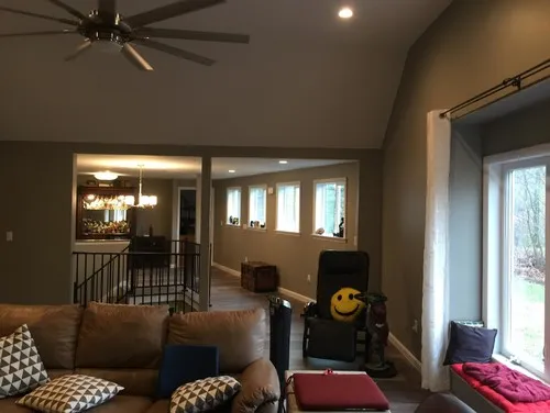 Family room with tan walls and open layout
