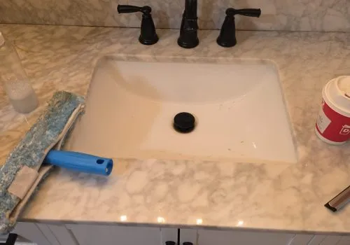 Cleaning a residential bathroom sink