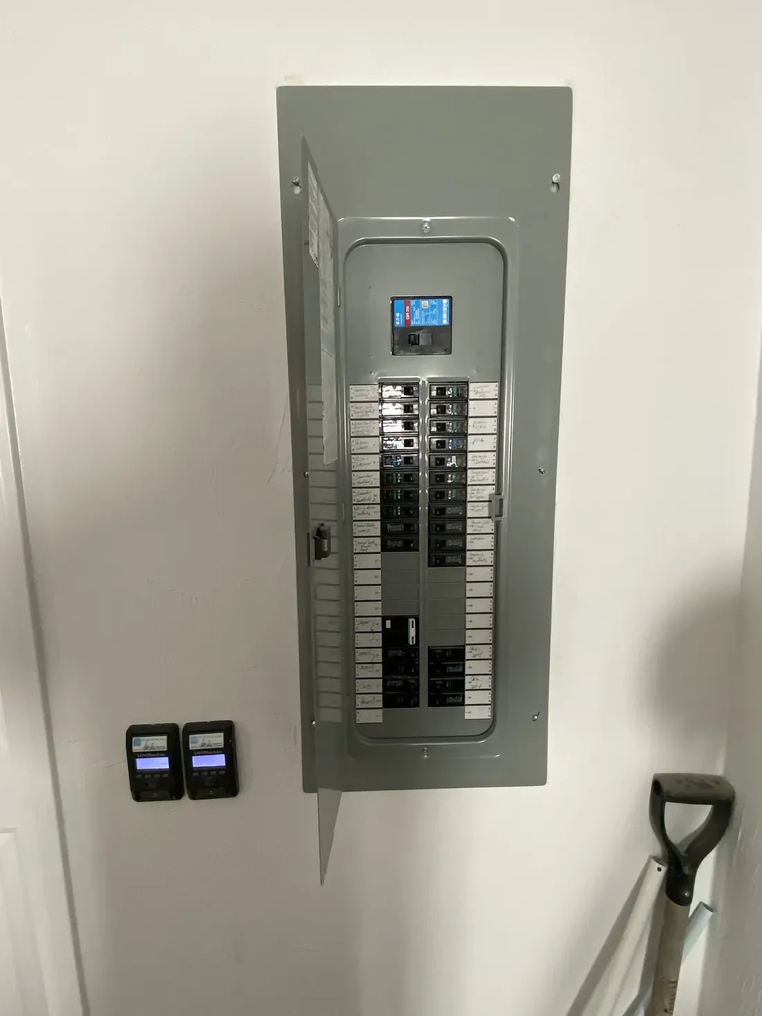 Interior electrical panel with the door open and every breaker labelled