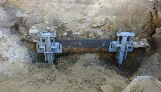 Helical pier being installed for foundation support