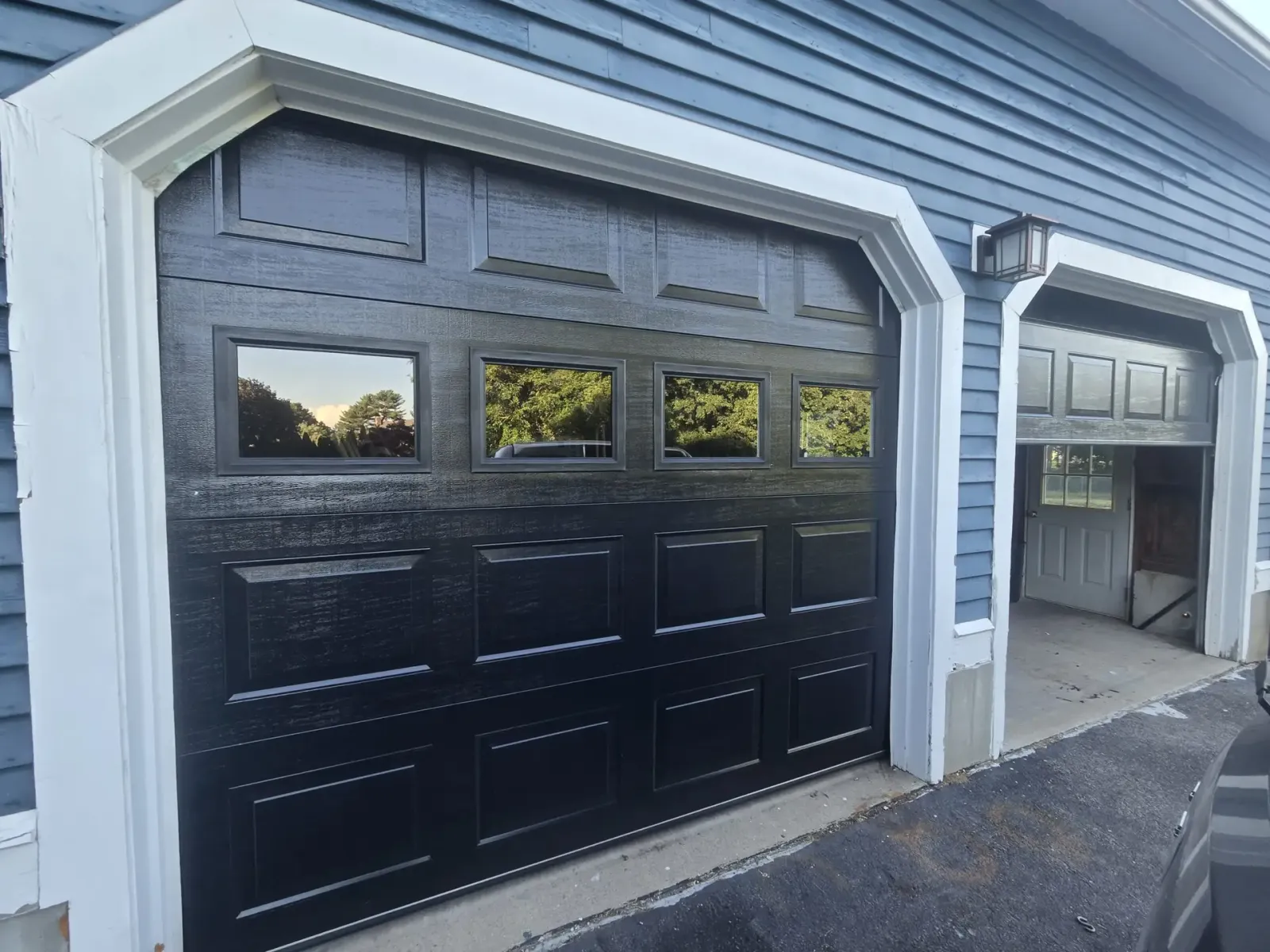 Modern Black Garage Door Installation Completed By Triple A Garage Doors In Winchester, Ma
