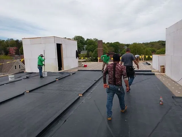 Peoples working on roof