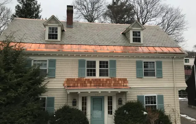 Tip Top Roofing Company