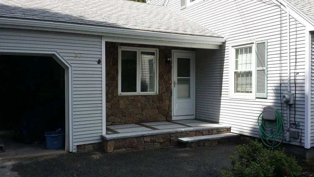 Stone veneer entry and front steps