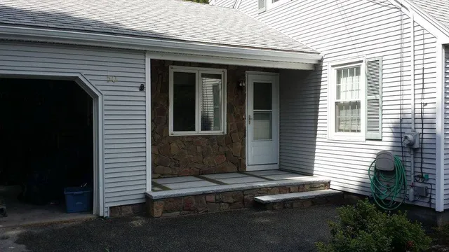 Stone veneer entry and front steps