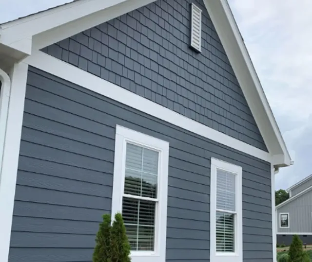 Close-up of gray vinyl siding on a home