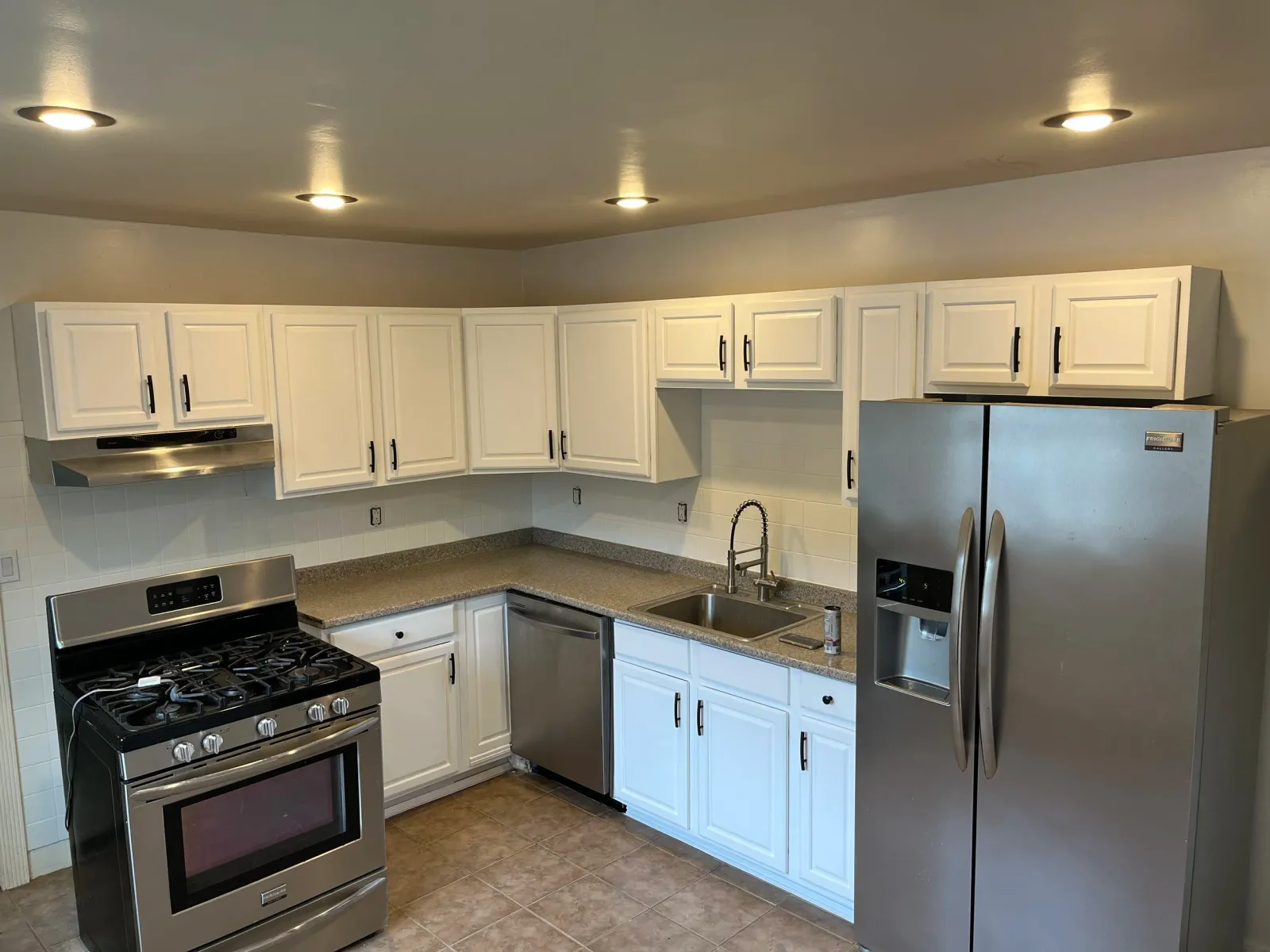 Full cabinet repaint in Somerville MA by Slim's Painting
