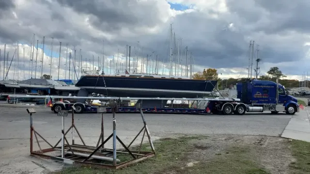 Boat transport of a Sabre 426 sailboat on a custom trailer at Torresen Marine in Muskegon, Michigan.