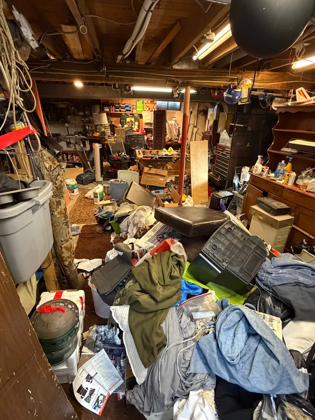 Basement cleanout in Kingston NH, before
